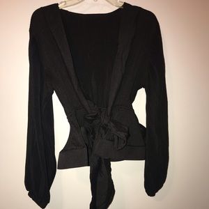 Ribbed Low Cut Peplum Tie Blouse
